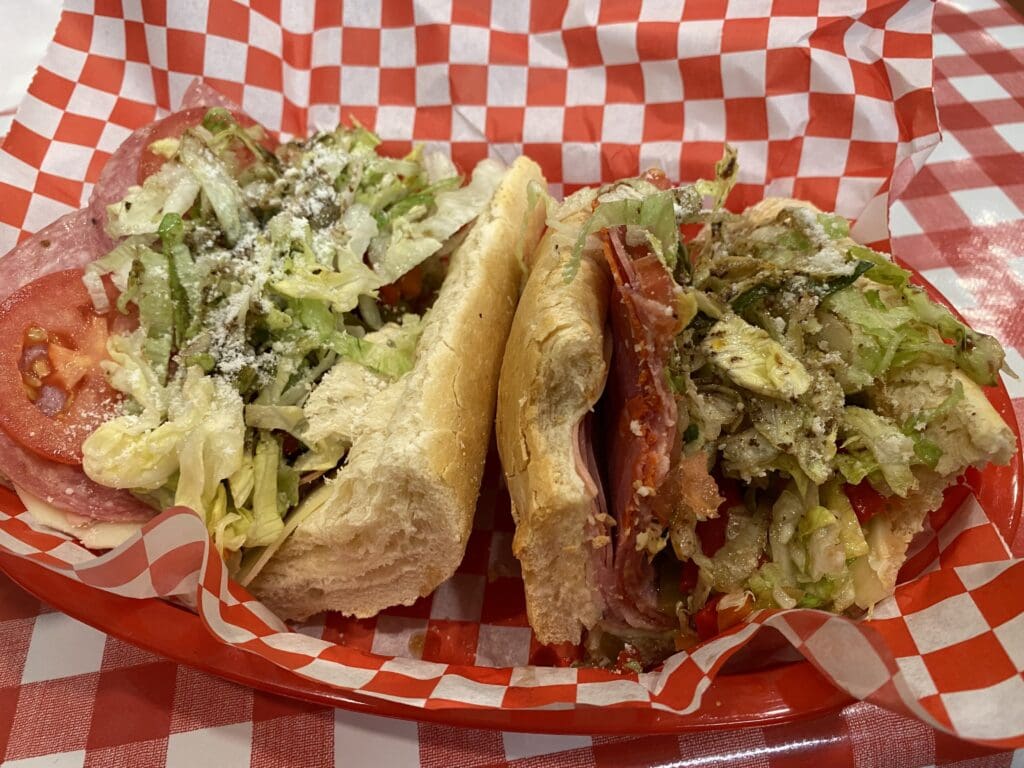 a sandwich with meat and vegetables