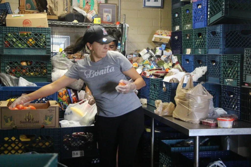 a woman standing in front of a store