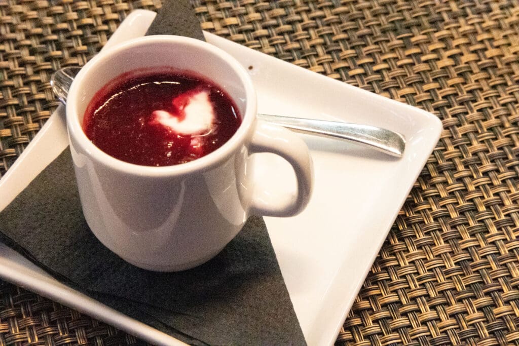 a close up of a coffee cup sitting on a table