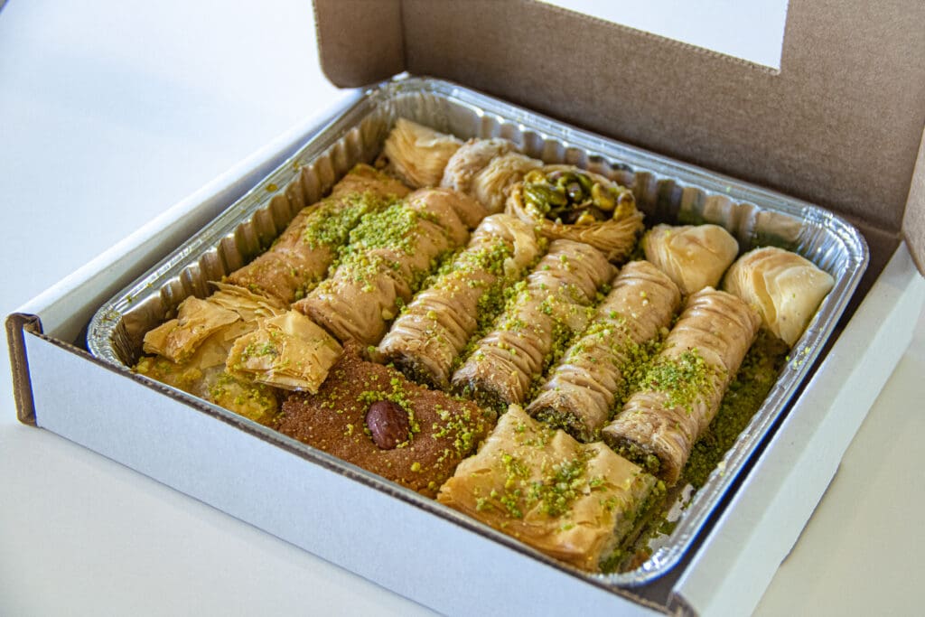 a box filled with different types of food on a table