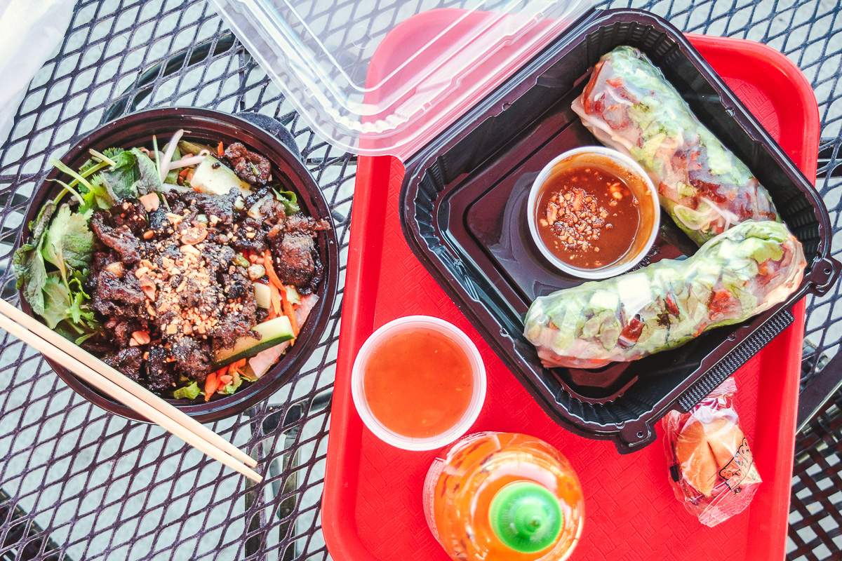 Grilled Bowl with vermicelli noodles and steak, Spring Rolls with BBQ pork at Wok Fire & Grill (Credit: Jackie Tran)