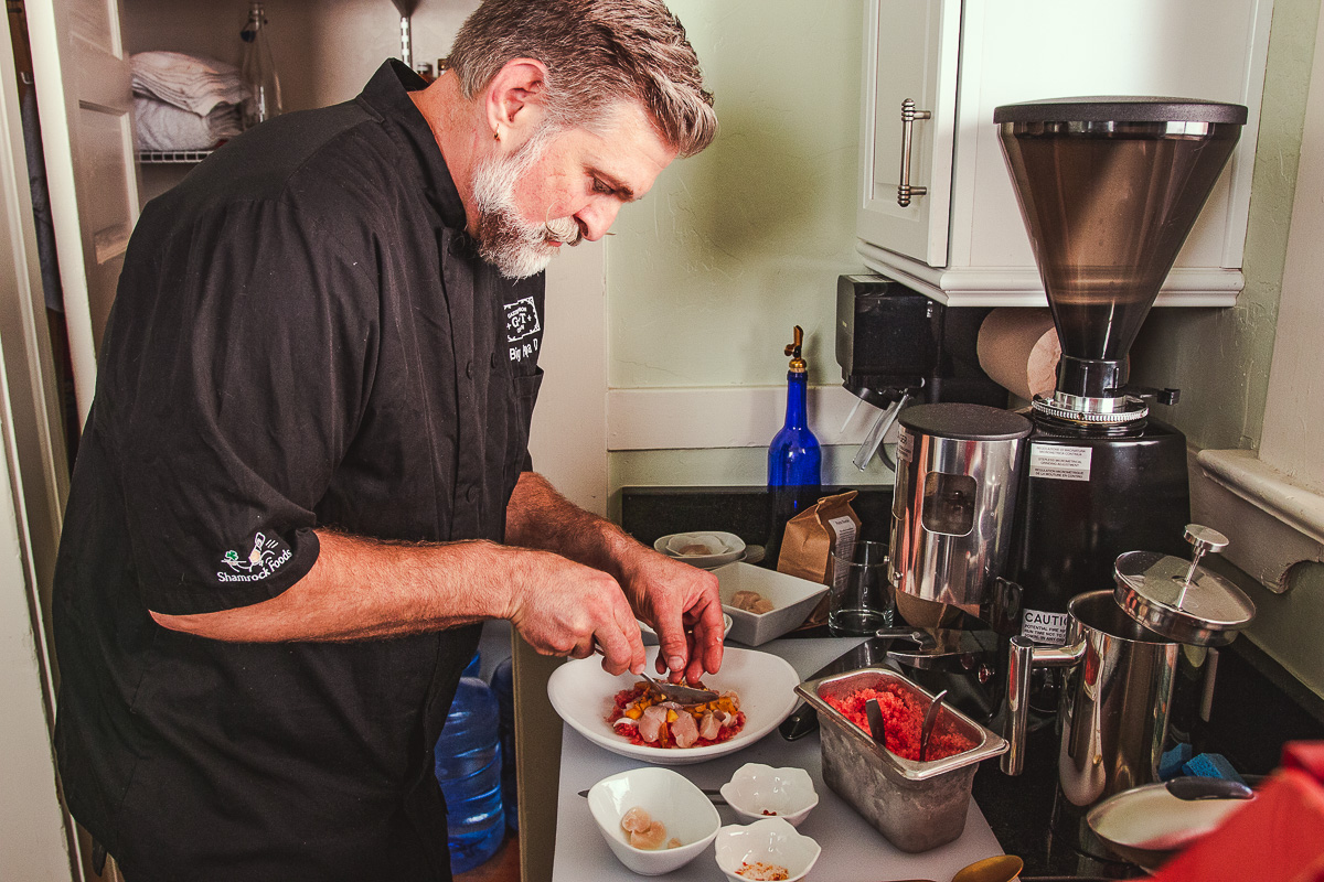 Devon Sanner preparing callo de hacha at Around the Table (Credit: Jackie Tran)