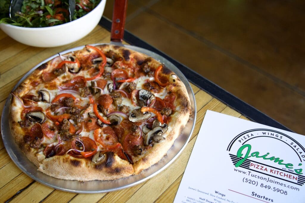 a pizza sitting on top of a table