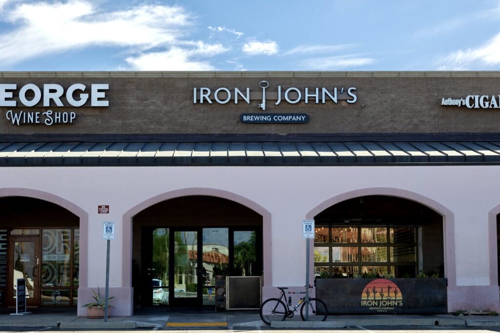 a sign in front of a building