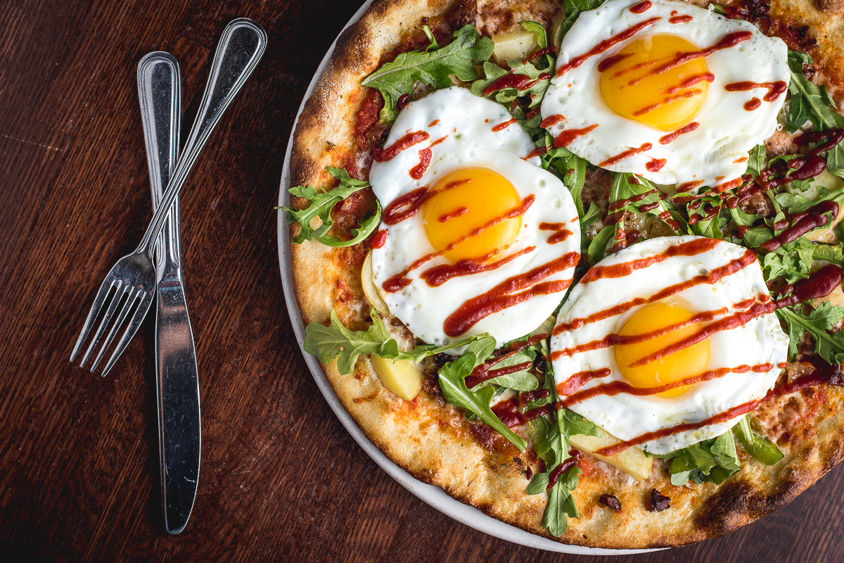 Weekend Brunch item Breakfast Pizza at Zona 78 (Credit: Jackie Tran)