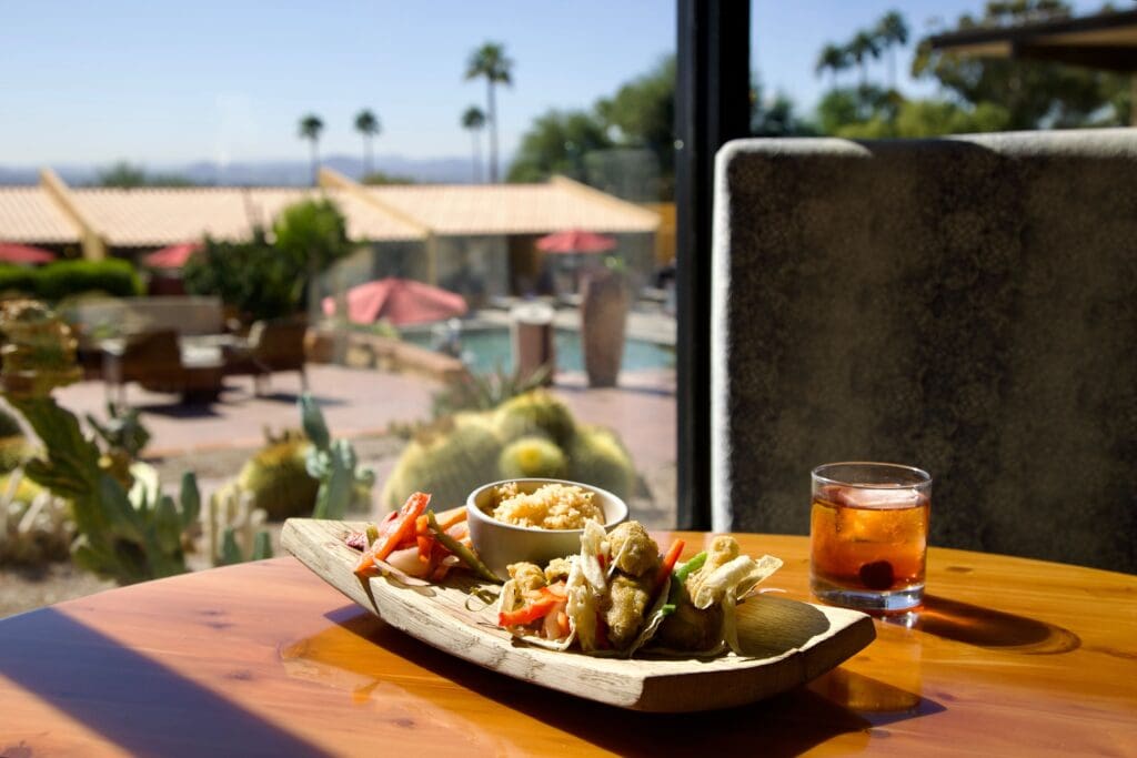 a plate of food on a picnic table