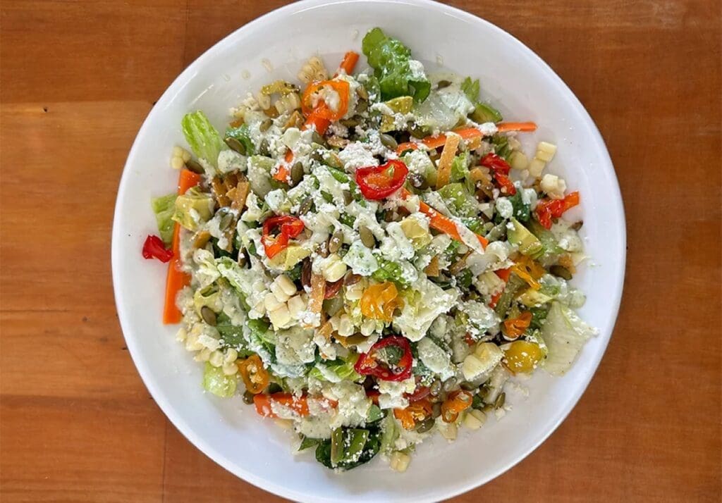 a bowl of salad on a plate