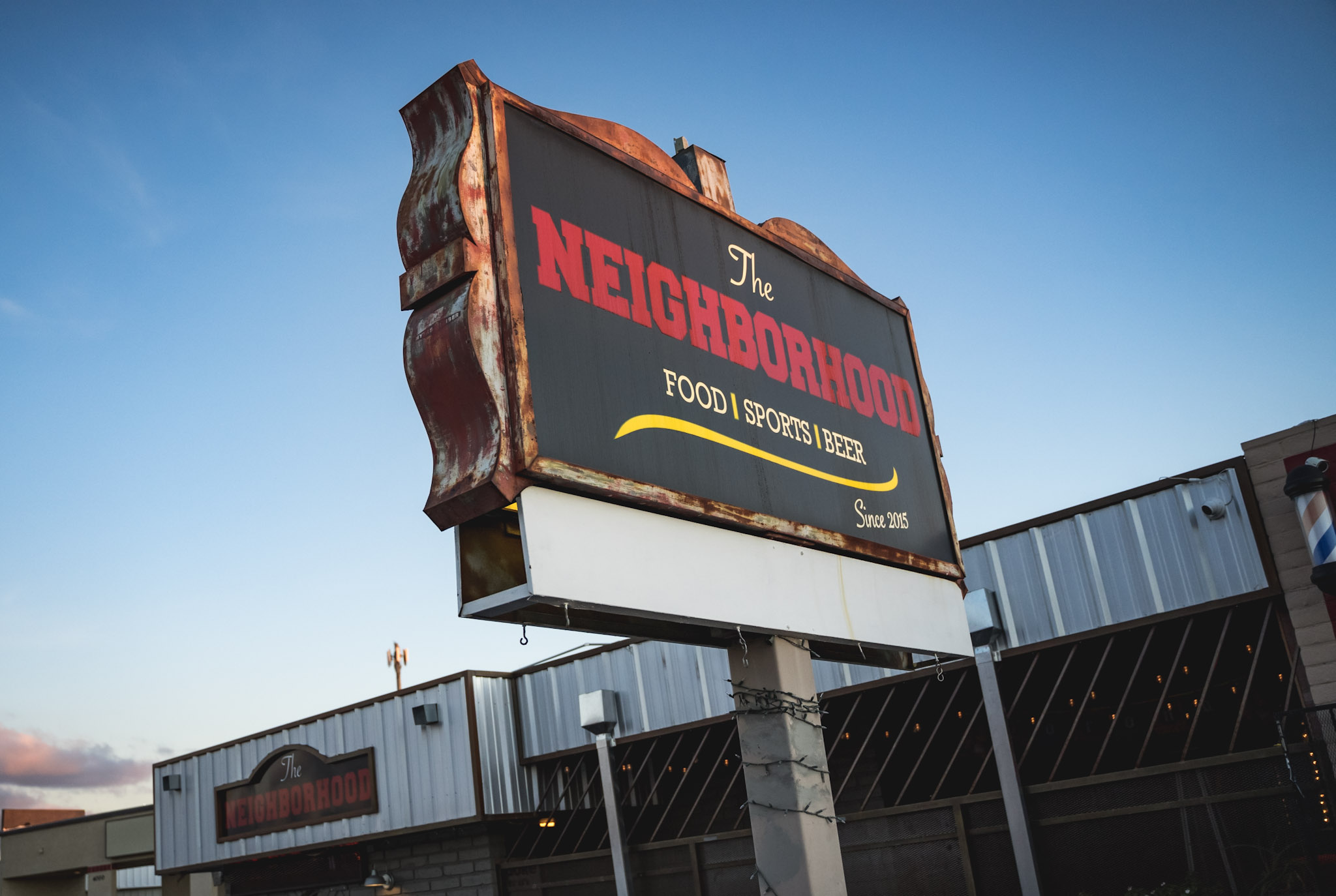 The Neighborhood sign