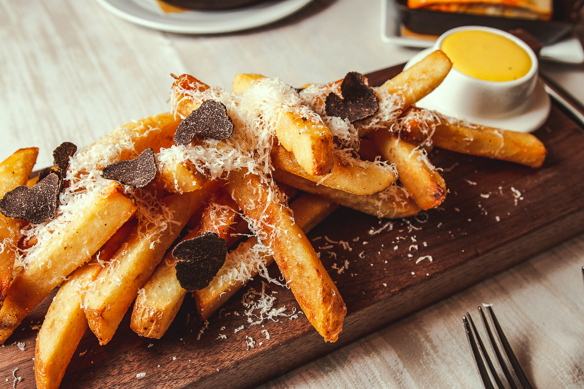 White Truffle French Fries plus freshly shaved black truffle at PY Steakhouse (Credit: Jackie Tran)